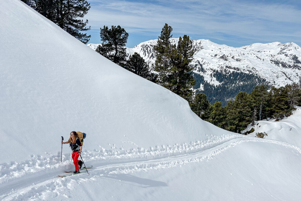Silvia Kreipl ski touring in snowy valley