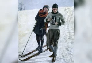 Advertisement for Kodak cameras from ‘Photoplay’, January 1921, showing skiing couple with Kodak folding camera