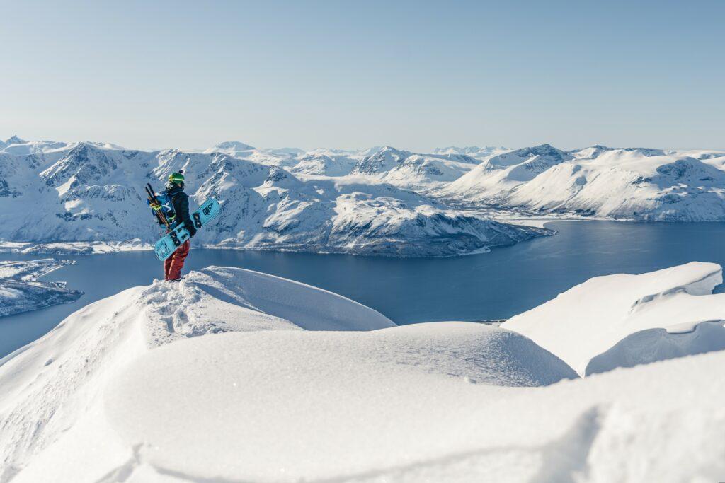 Ogso Rider: Michael Drack Standing on top of a snowy mountain in Norway