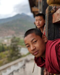 kids in Nyamai Zam Footbridge, Paro, Bhutan